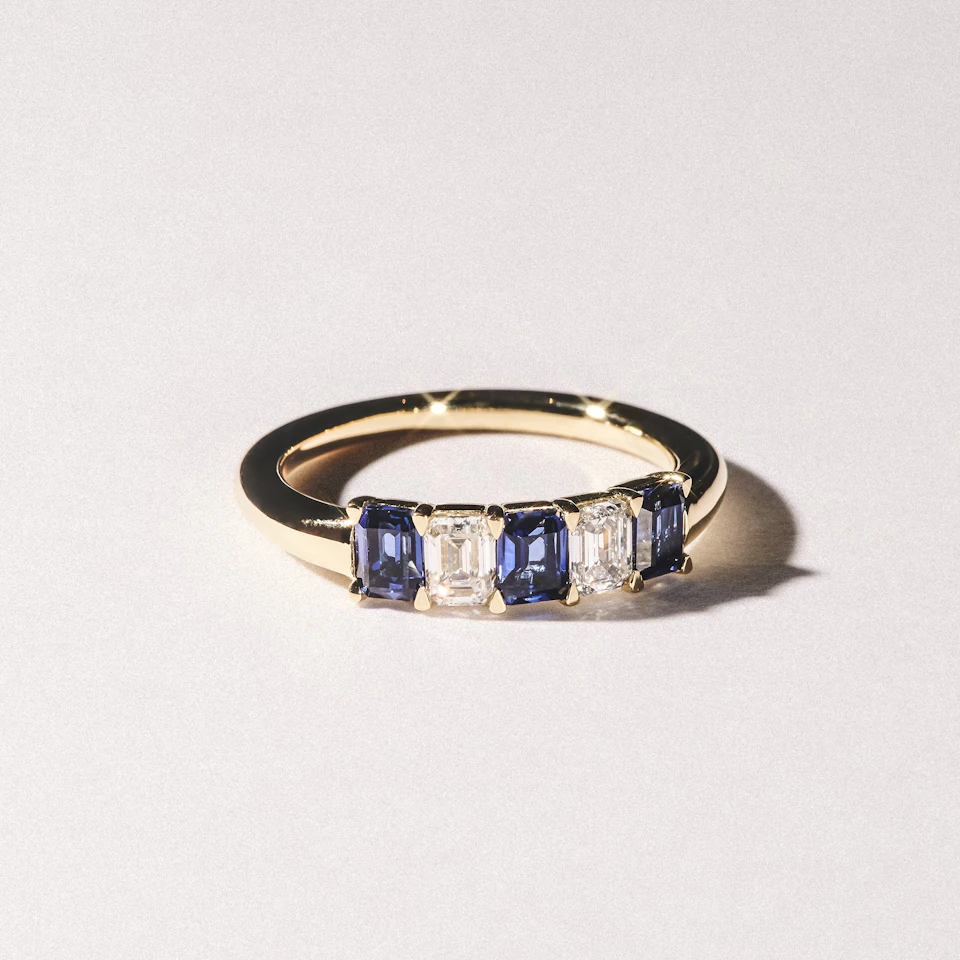 Solene 0.75ct Emerald Cut Lab Sapphire and Lab Diamond Half Band Eternity Ring in 18K Yellow Gold
