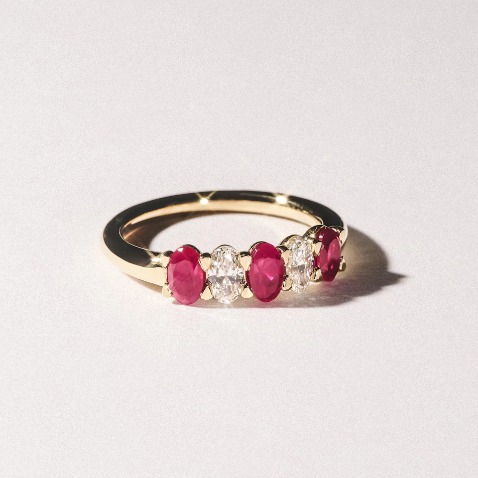 Solene 0.75ct Oval Cut Lab Ruby and Lab Diamond Half Band Eternity Ring in 18K Yellow Gold