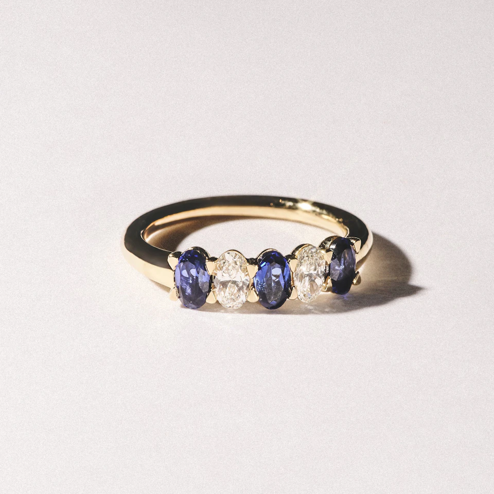 Solene 0.75ct Oval Cut Lab Sapphire and Lab Diamond Half Band Eternity Ring in 18k Yellow Gold