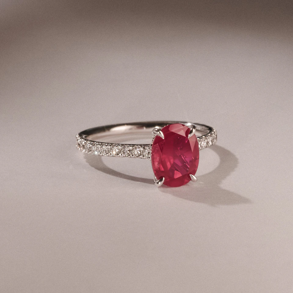 Amora Gem 2.00ct Oval Cut Lab Ruby Hidden Halo Engagement Ring with Side Stones in 18K White Gold