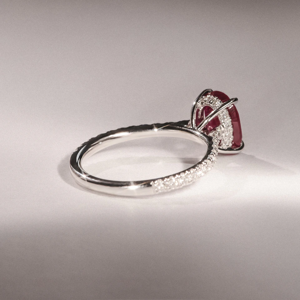 Amora Gem 2.00ct Oval Cut Lab Ruby Hidden Halo Engagement Ring with Side Stones in 18K White Gold