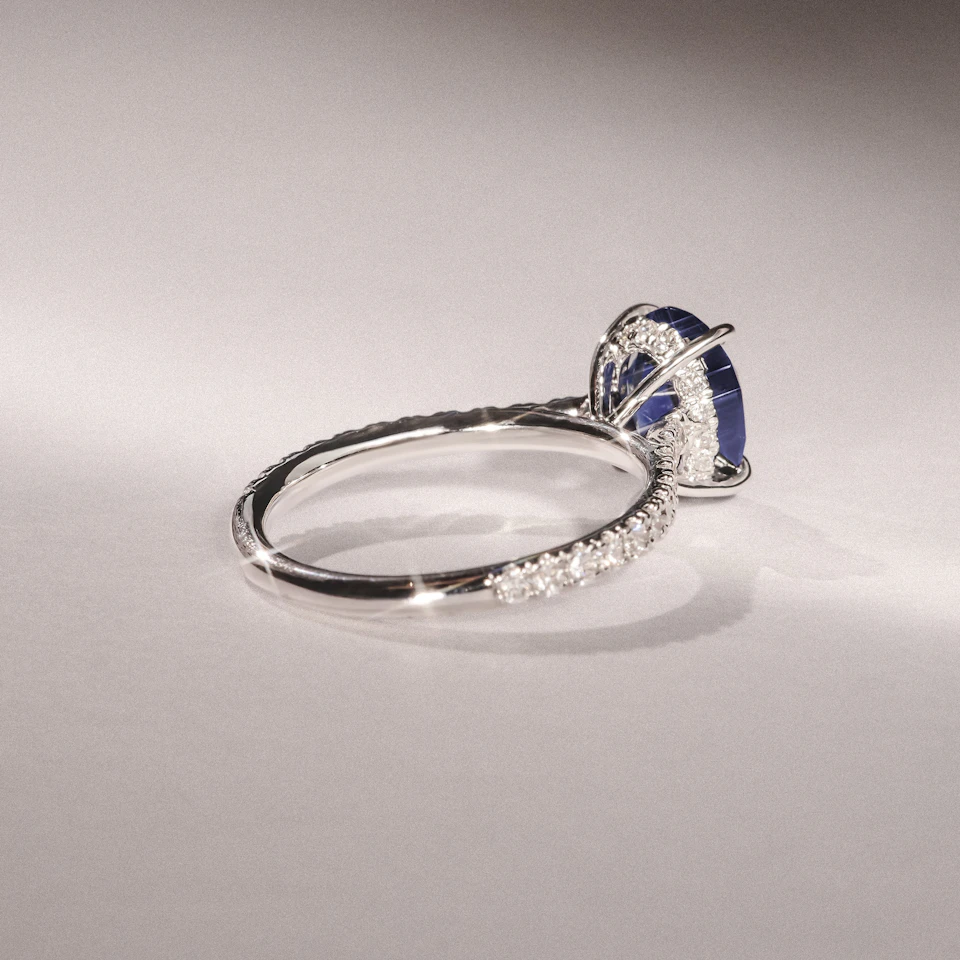 Amora Gem 2.00ct Oval Cut Lab Sapphire Hidden Halo Engagement Ring with Side Stones in 18K White Gold