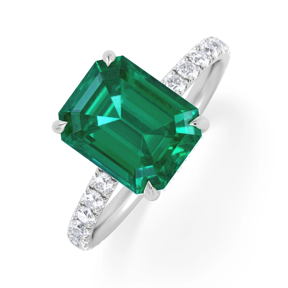 Amora Gem 2.50ct Emerald Cut Lab Emerald Hidden Halo Engagement Ring with Side Stones in 18K White Gold