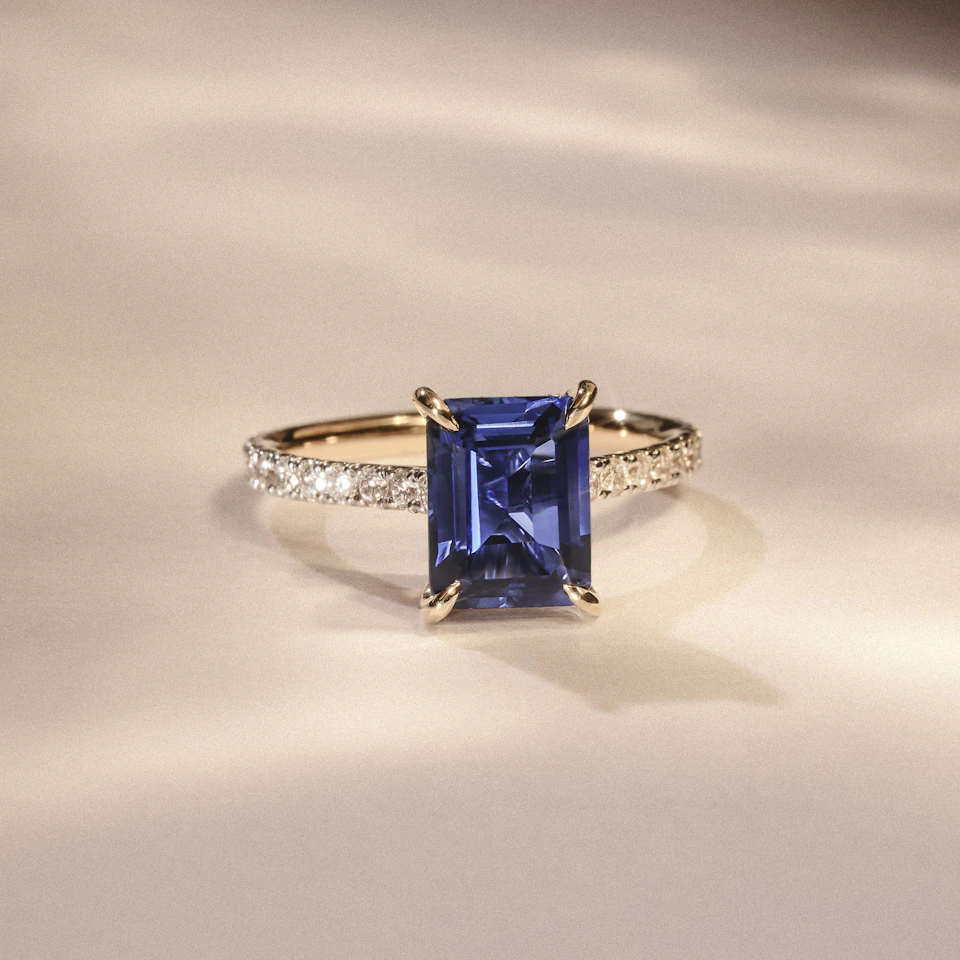 Amora Gem 2.50ct Emerald Cut Lab Sapphire Hidden Halo Engagement Ring with Side Stones in 18K Yellow Gold