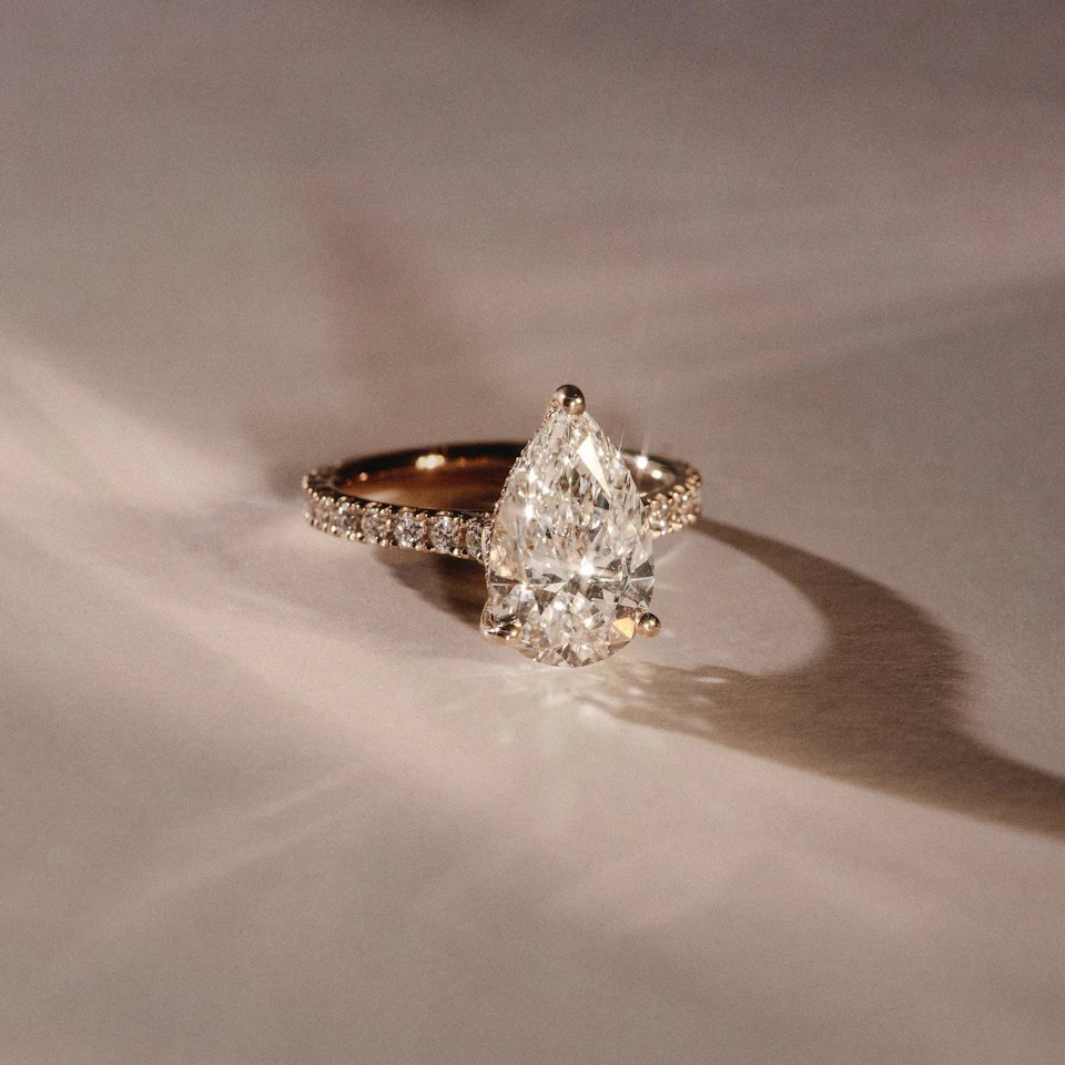 Amora Pear 3.36ct Hidden Halo Lab Diamond Engagement Ring With Side Stones Set in 18K Gold