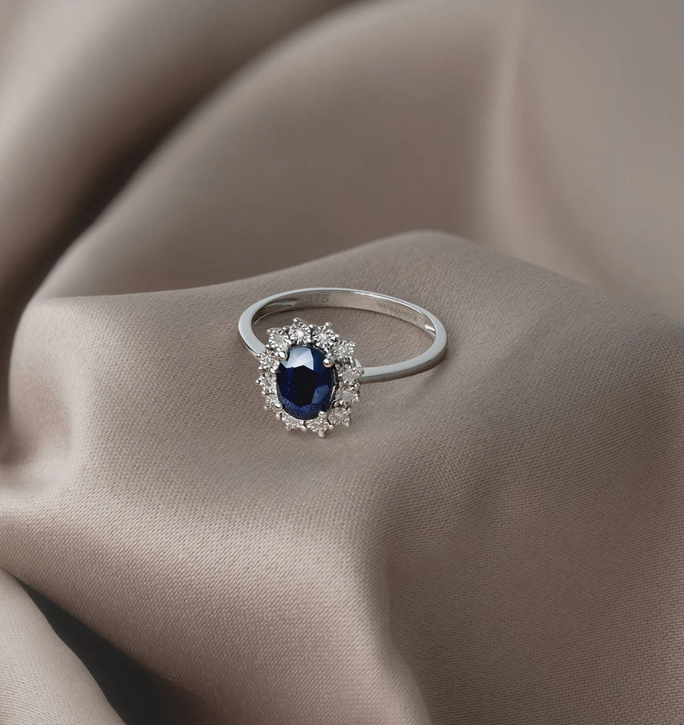 Sapphire Ring With Diamond Halo 7 x 5mm Set in 9K White Gold