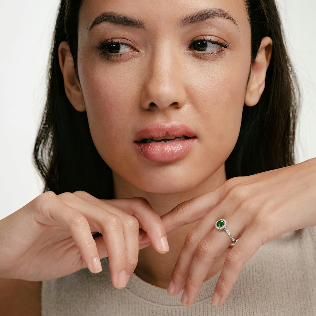 Halo Emerald 0.50ct And Diamond 18K White Gold Ring