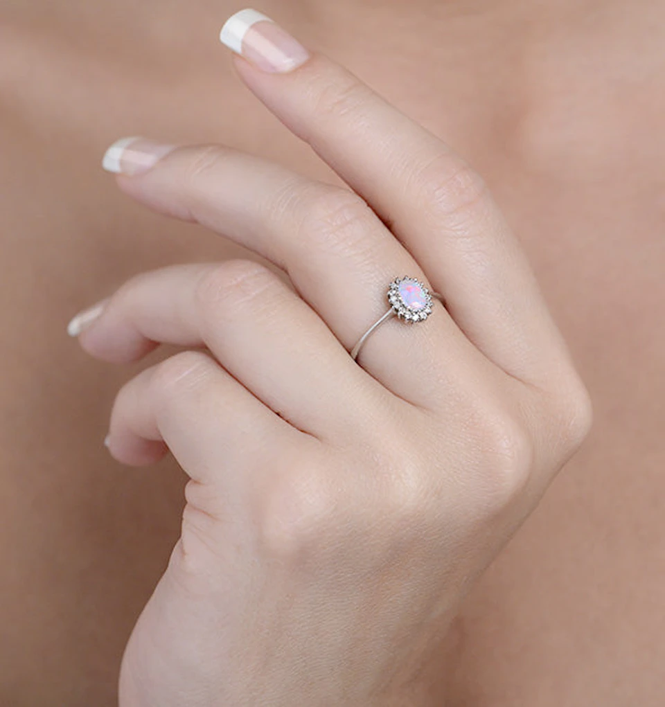 Opal 6 x 4mm And Diamond 9K White Gold Ring