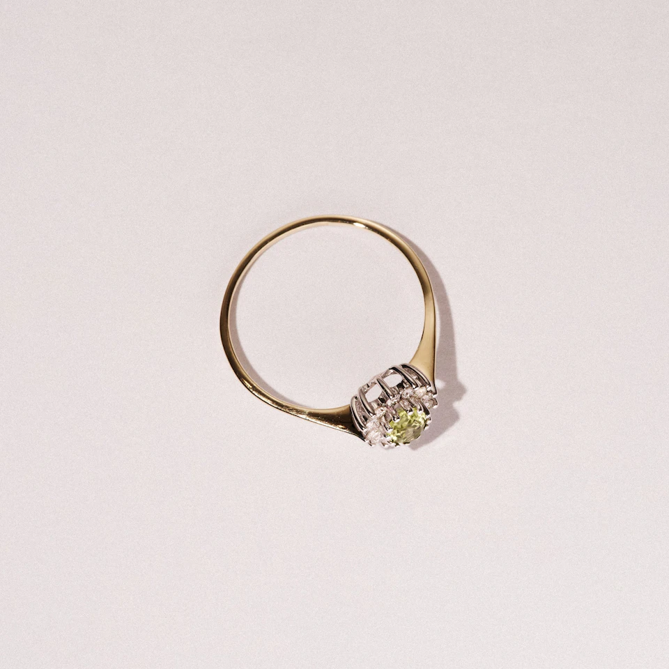 Peridot 5 x 3mm And Diamond 9K Yellow Gold Ring