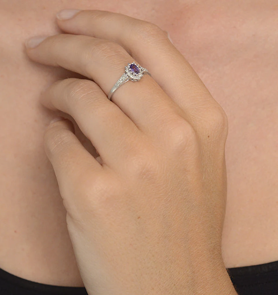 Tanzanite 5 x 3mm And Diamond 9K White Gold Ring