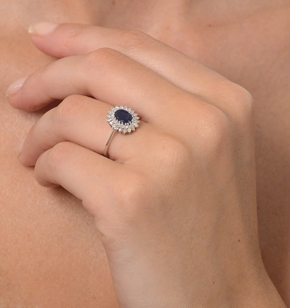 Sapphire 7 x 5mm And Diamond 9K White Gold Ring