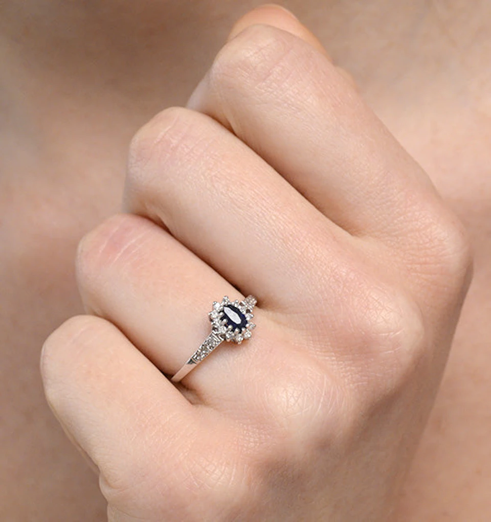 Sapphire 5 x 3mm And Diamond 9K White Gold Ring