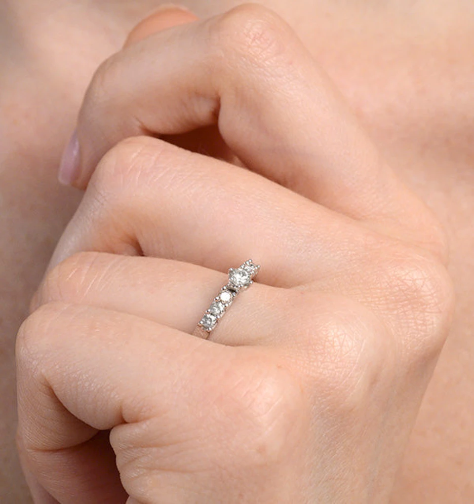 Sidestone Engagement Ring With 0.33ct of Diamonds set in 9K White Gold