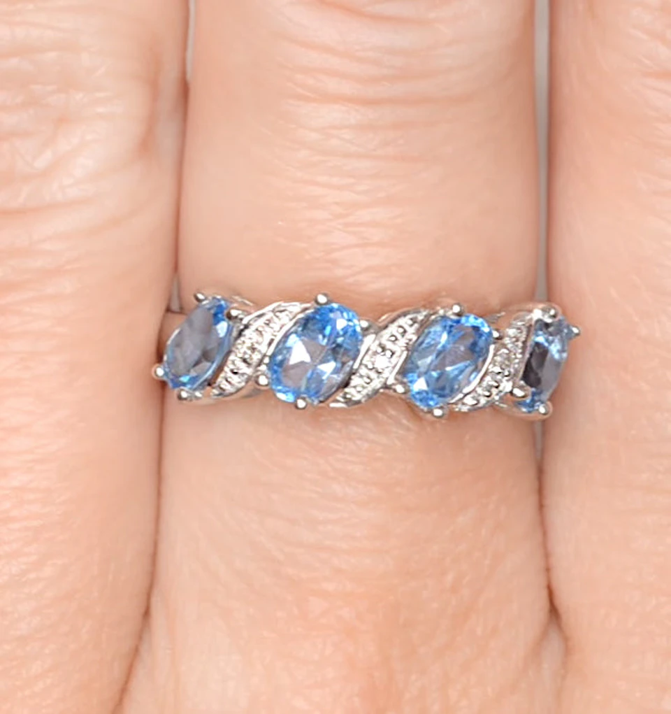 Blue Topaz 0.98CT And Diamond 9K White Gold Ring
