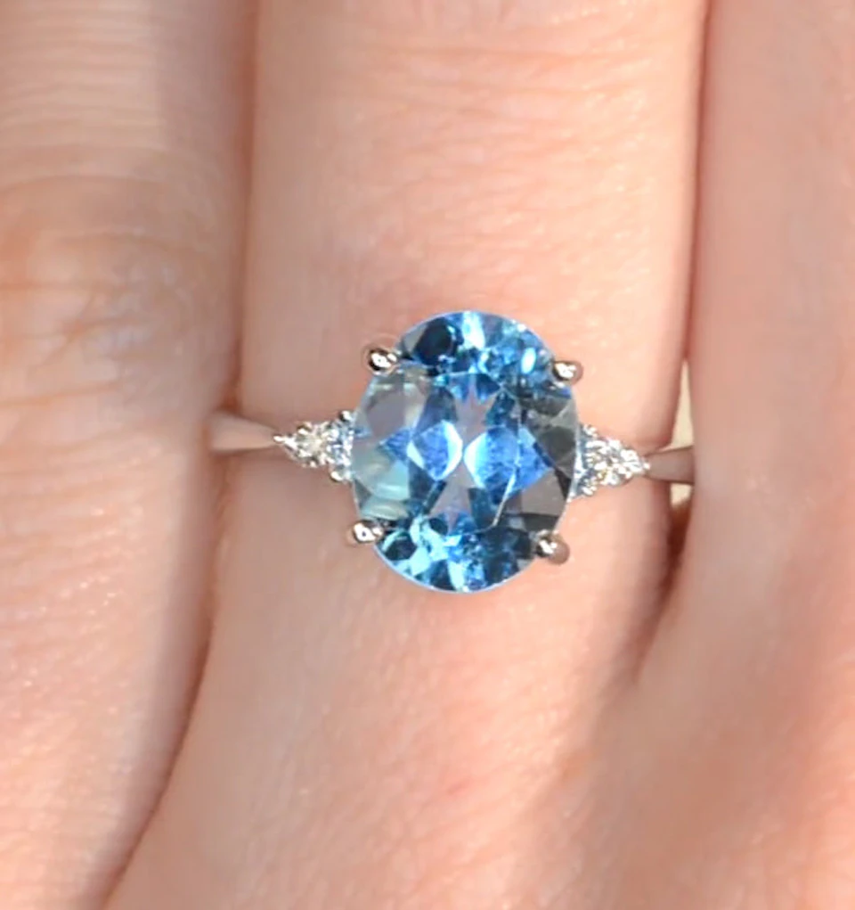 9K White Gold Diamond and 2.60ct Blue Topaz Ring