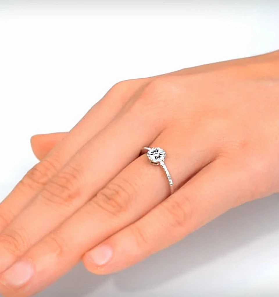 Halo Ring with 0.11ct of Diamonds set in 9K White Gold