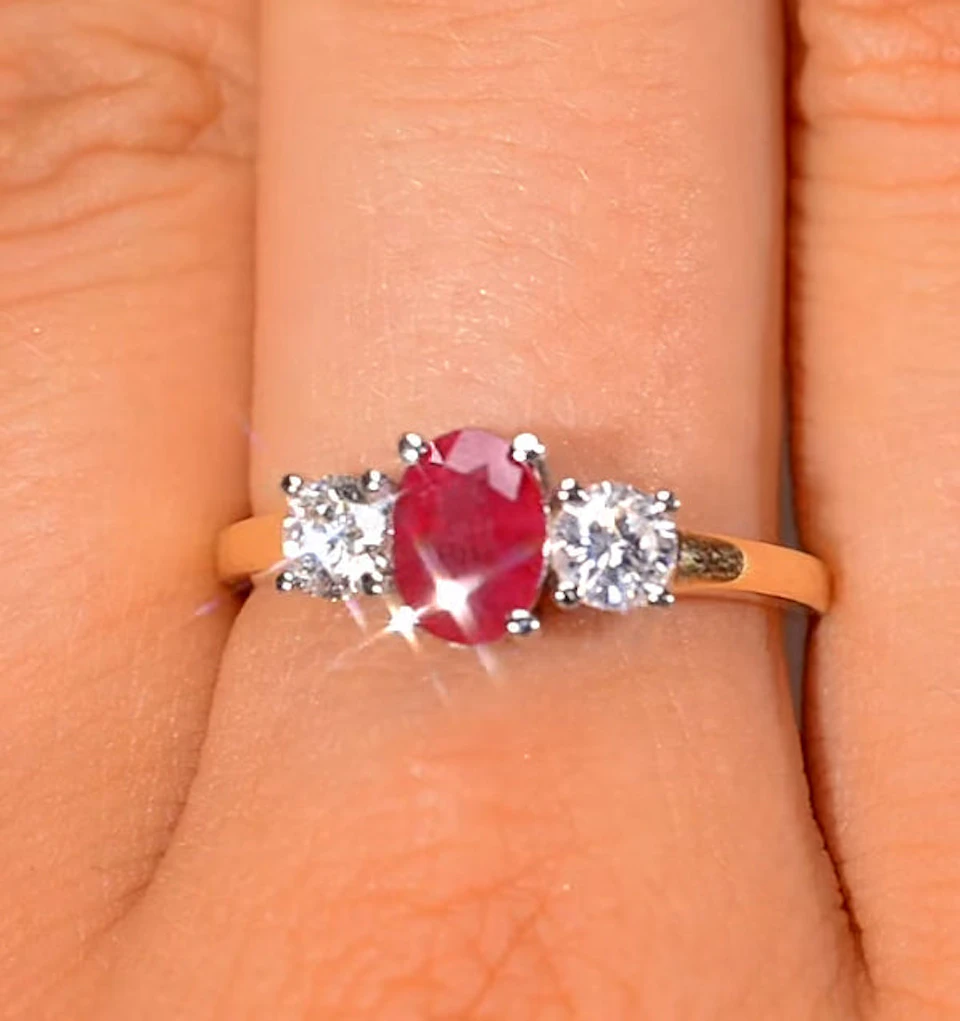 1.15ct Oval Cut Ruby and Lab Diamond 3 Stone Ring in 9K Yellow Gold