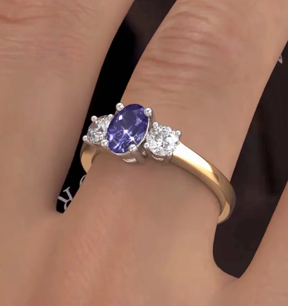 Tanzanite 7 x 5mm And Diamond 18K Gold Ring FET23-V
