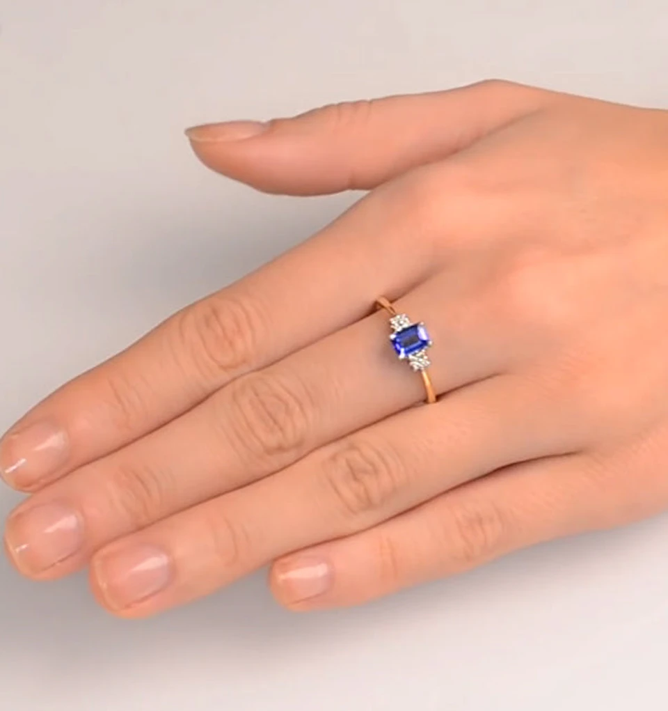Tanzanite 6 x 4mm And Diamond 18K Gold Ring FET37-V