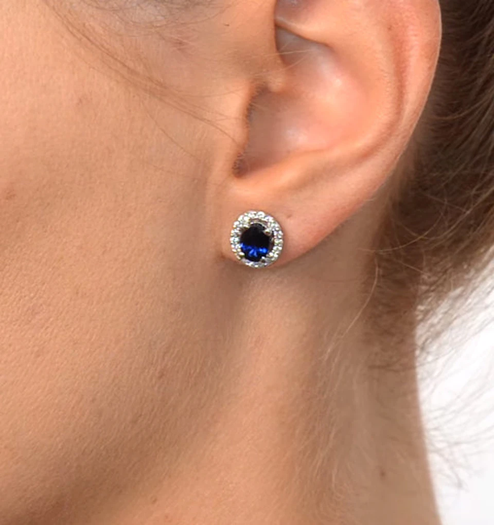Sapphire 7mm x 5mm And Diamond 18K White Gold Earrings