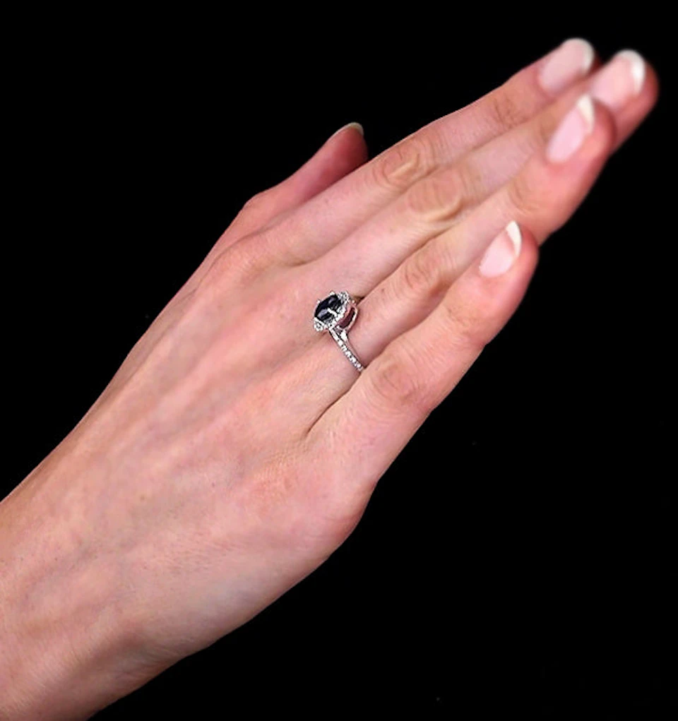 Blue Sapphire and Diamond Halo Ring Set in 18K White Gold